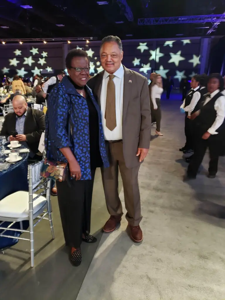 TDJBCF Honorary Board Member Jan Adams, CEO, JMA Solutions & President & CEO, Ideal Electrical Supply Corporation with the late Rev. Jesse Jackson